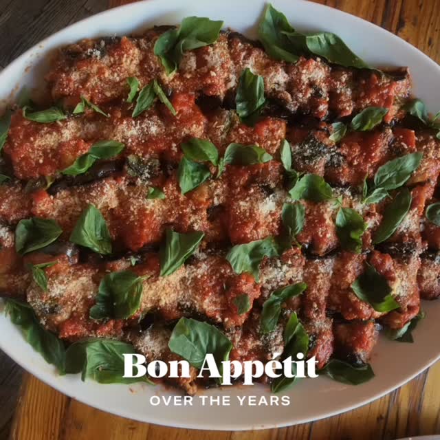 Eggplant parmigiana with tomato sauce and basil