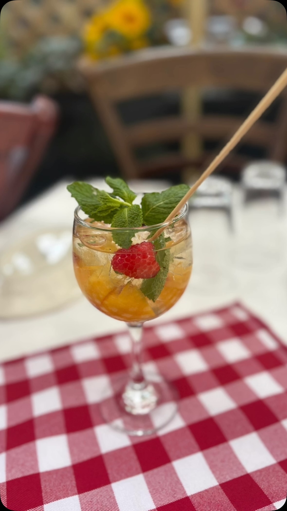 Cocktail on a red checkered tablecloth